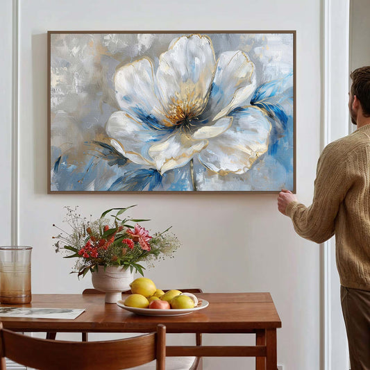 Tableau sur toile d'une fleur blanche avec des taches bleues