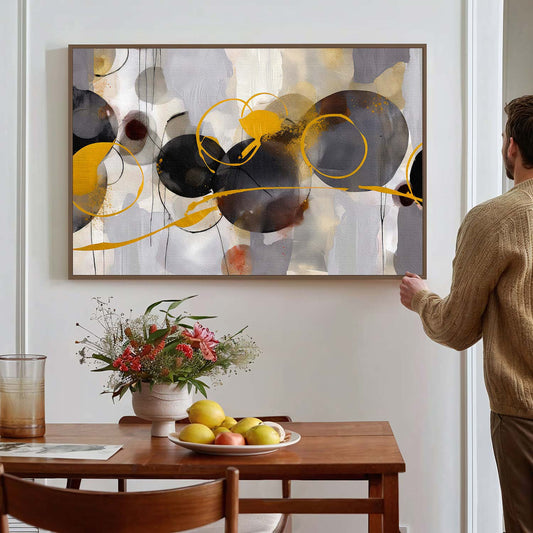 Tableau abstrait de cercles noir et doré