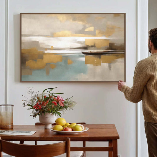 Tableau sur toile de navire doré sur un fond beige